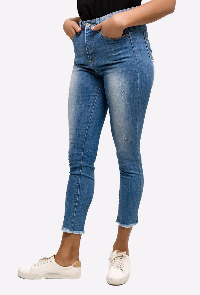 Light Blue Skinny Jeans With Raw Edges